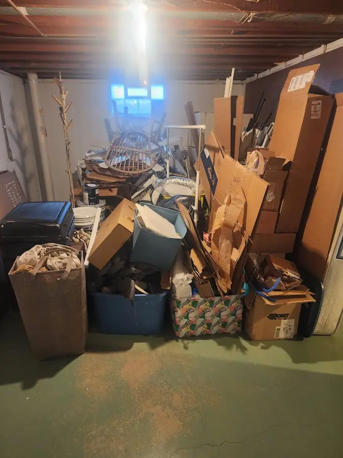 Roll-off dumpster container at job site for Yard Waste Dumpster Rental in Grimes